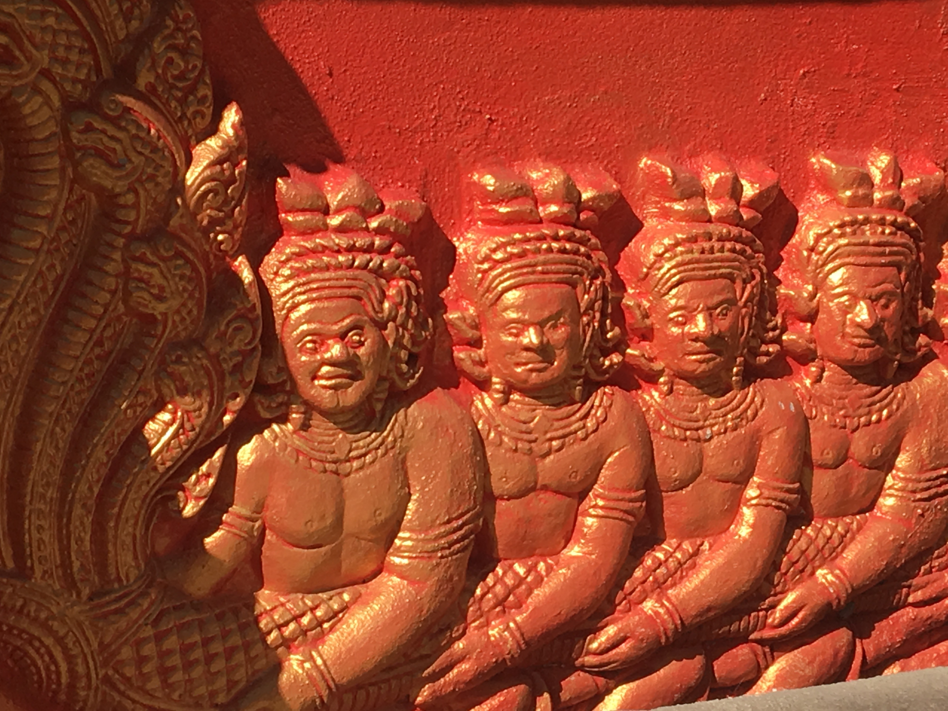 Main gate, detail of guardian figures and naga